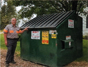 Nisley Trash Dumpster with Employee